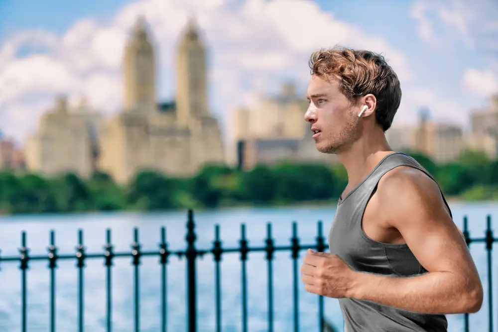 Wireless,Earbuds,Man,Running,In,Central,Park,New,York,City